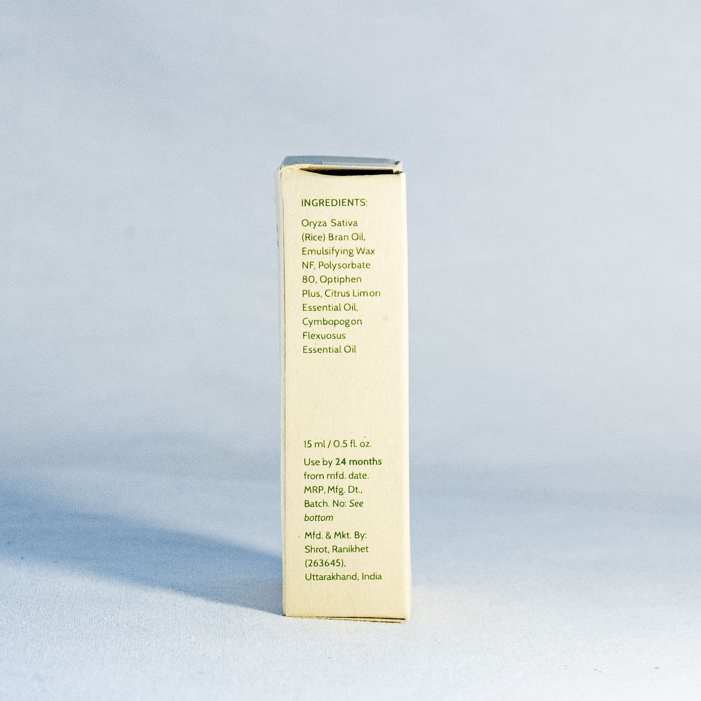 Natural skincare product packaging by Shrot with ingredient list on a light gray background