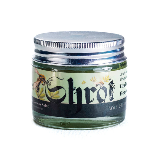 Jar of Shrot Hemp Beeswax Natural Moisturizer with a silver lid on a white background. Front angle.