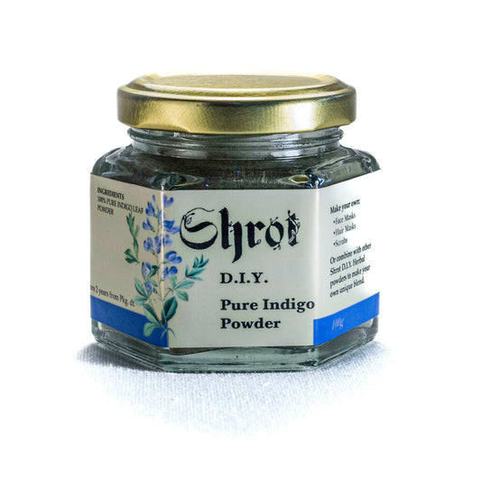 Jar of Shrot Pure Indigo Powder with a gold lid on a white background. Front angle.