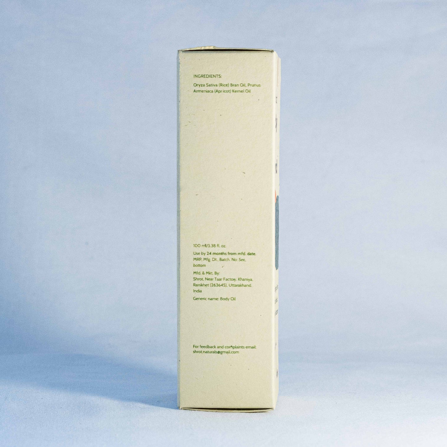 Skincare product box with text by a natural skincare brand called Shrot on a light blue background