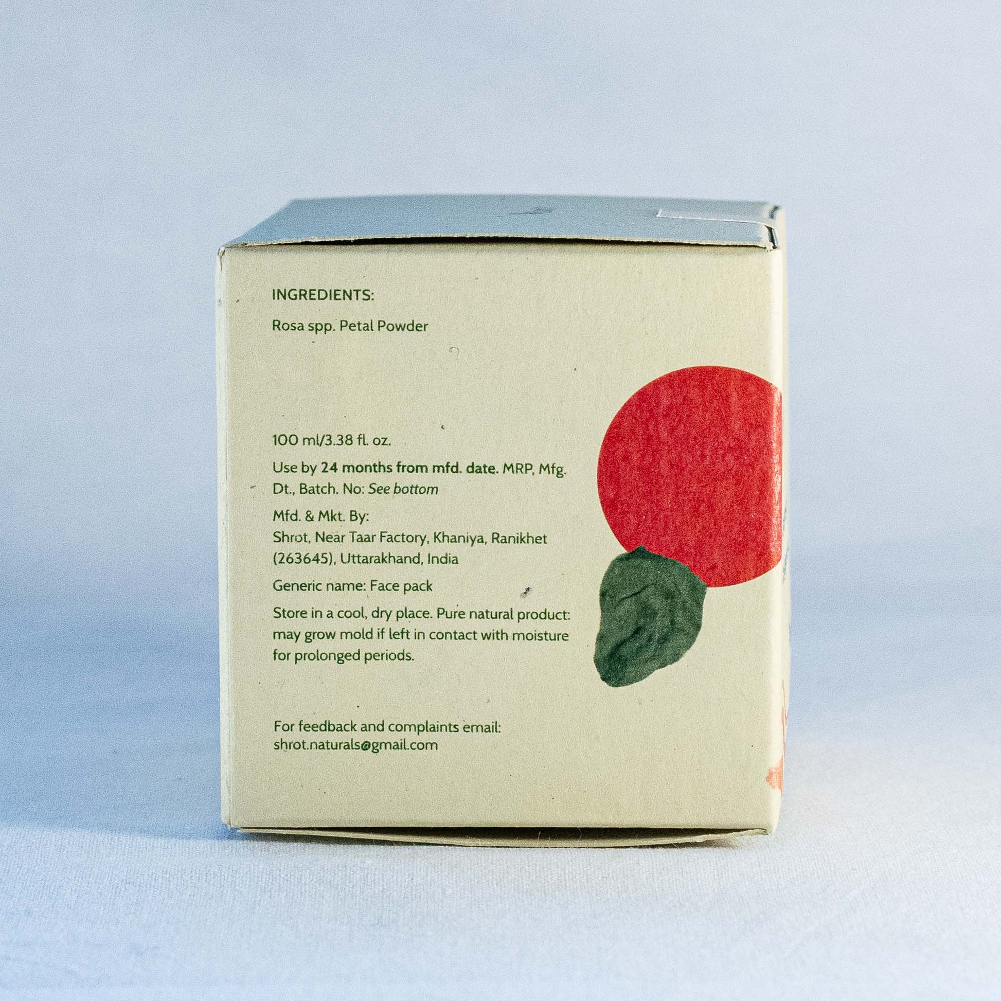 Back of a skincare product box by Shrot natural skincare with ingredient list and branding on a light blue background