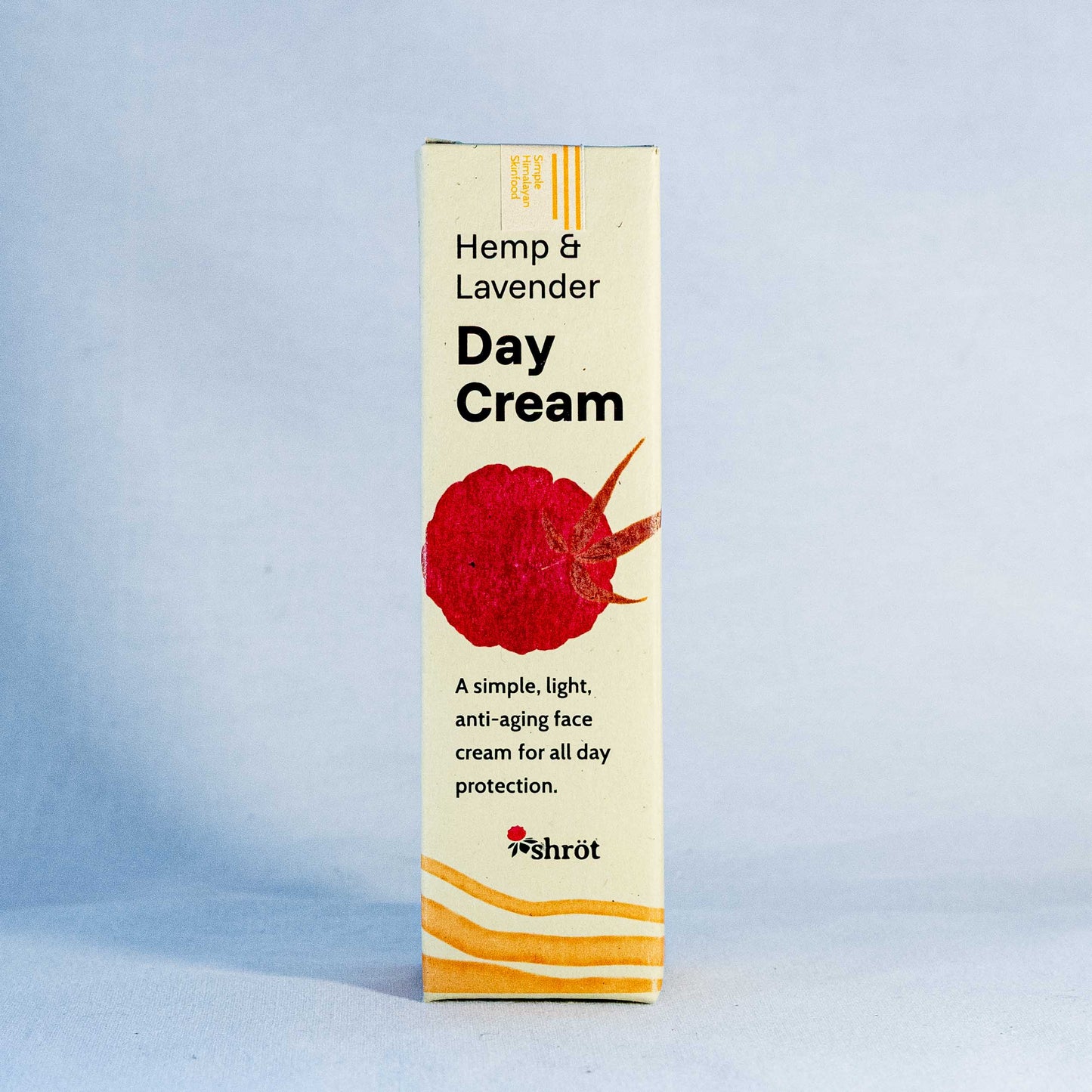 Box of Hemp & Lavender Day Cream by a trending Indian skincare brand called Shrot on a light blue background