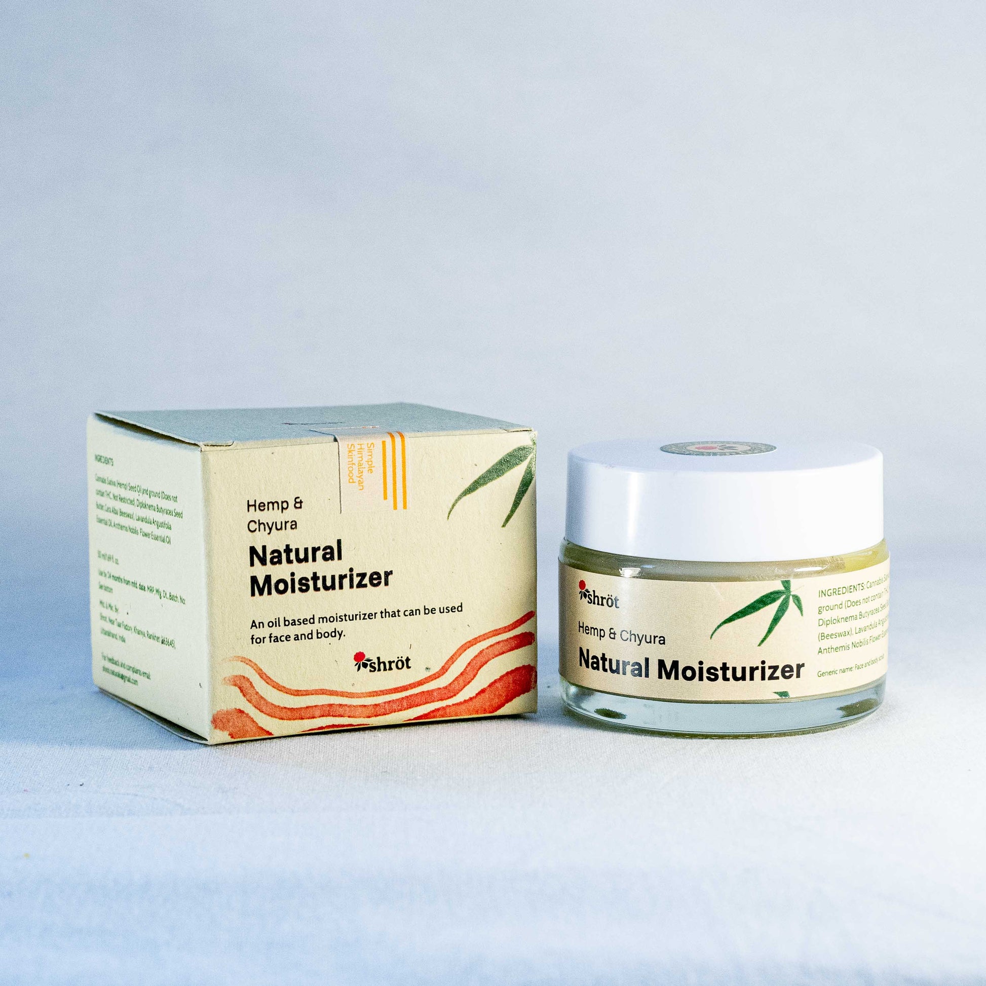 Jar of natural moisturizer by a natural skincare brand called Shrot with packaging on a light gray background