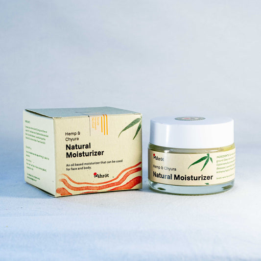 Jar of natural moisturizer by a natural skincare brand called Shrot with packaging on a light gray background