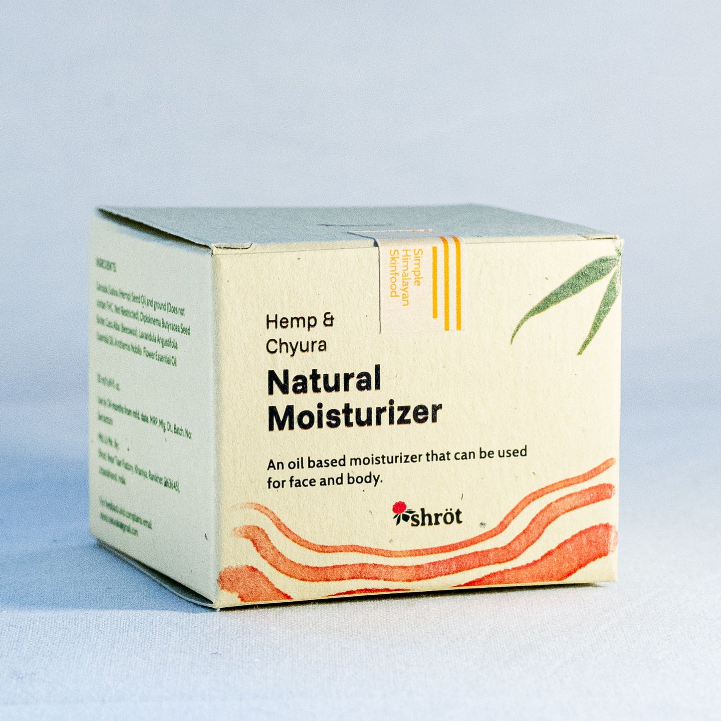 Box of Hemp & Chyura Natural Moisturizer by a natural skincare brand called Shrot on a light blue background