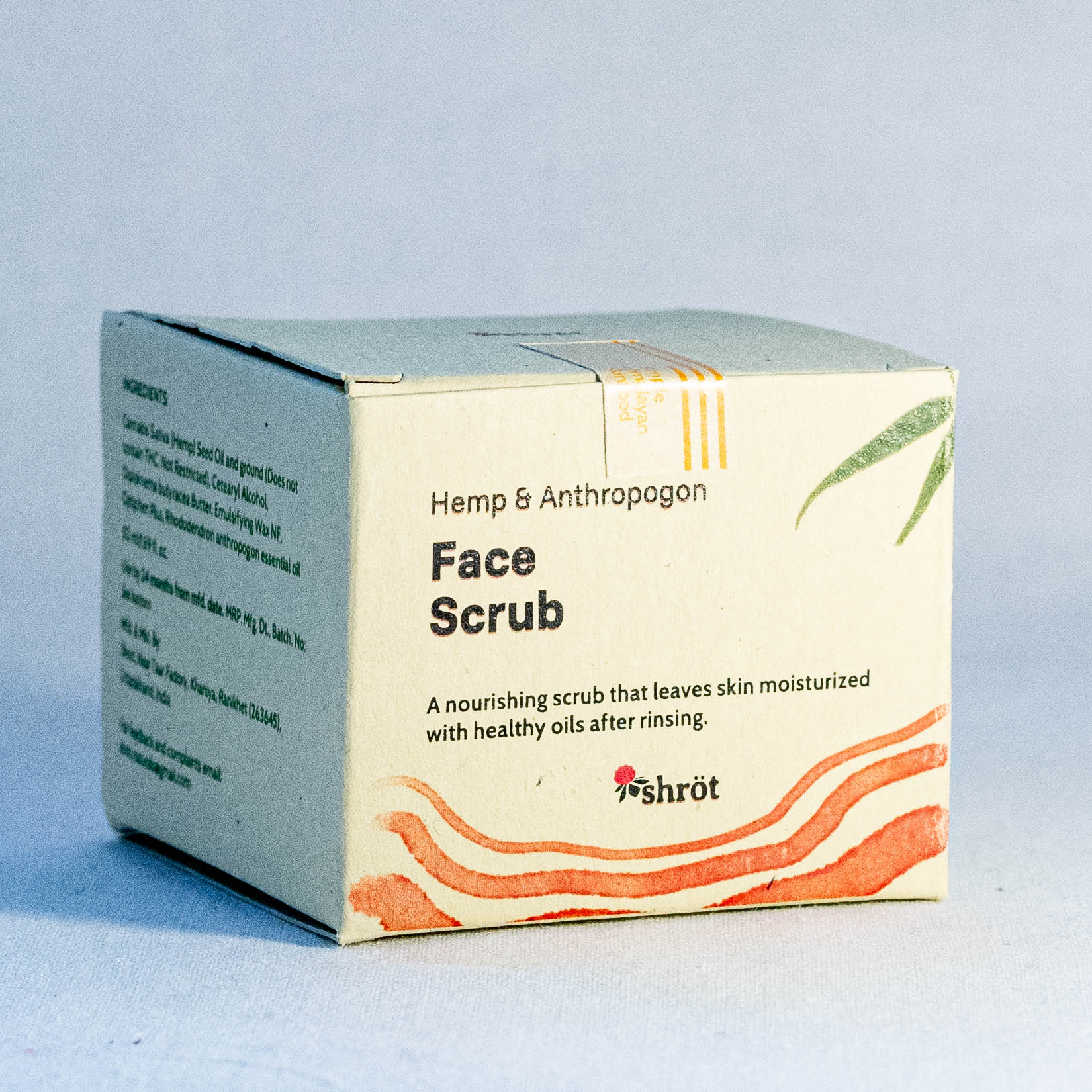 Box of Hemp & Anthropogon Face Scrub by a natural skincare brand called Shrot on a light blue background