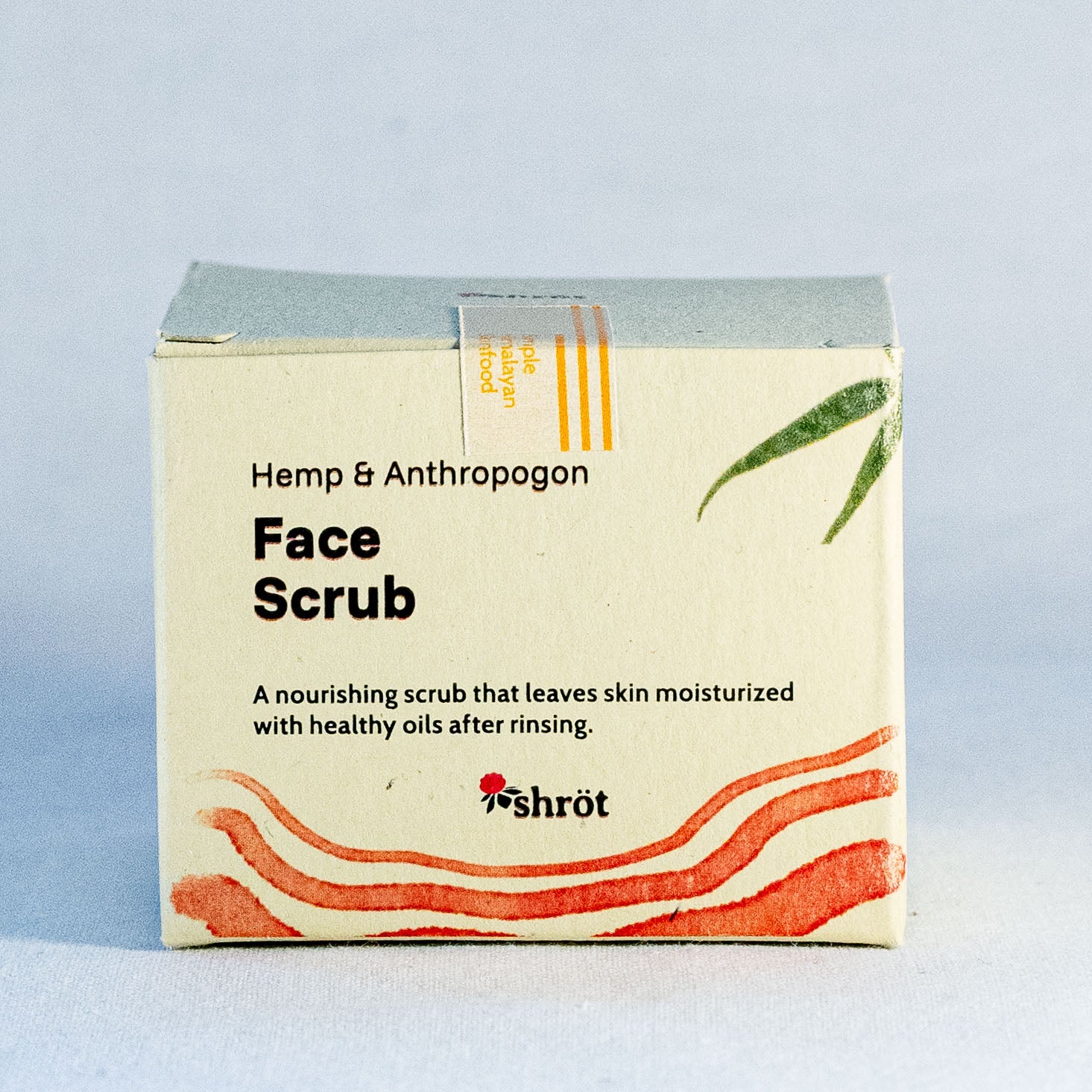Box of Hemp & Anthropogon Face Scrub with branding on a light gray background by a natural skincare brand called Shrot 