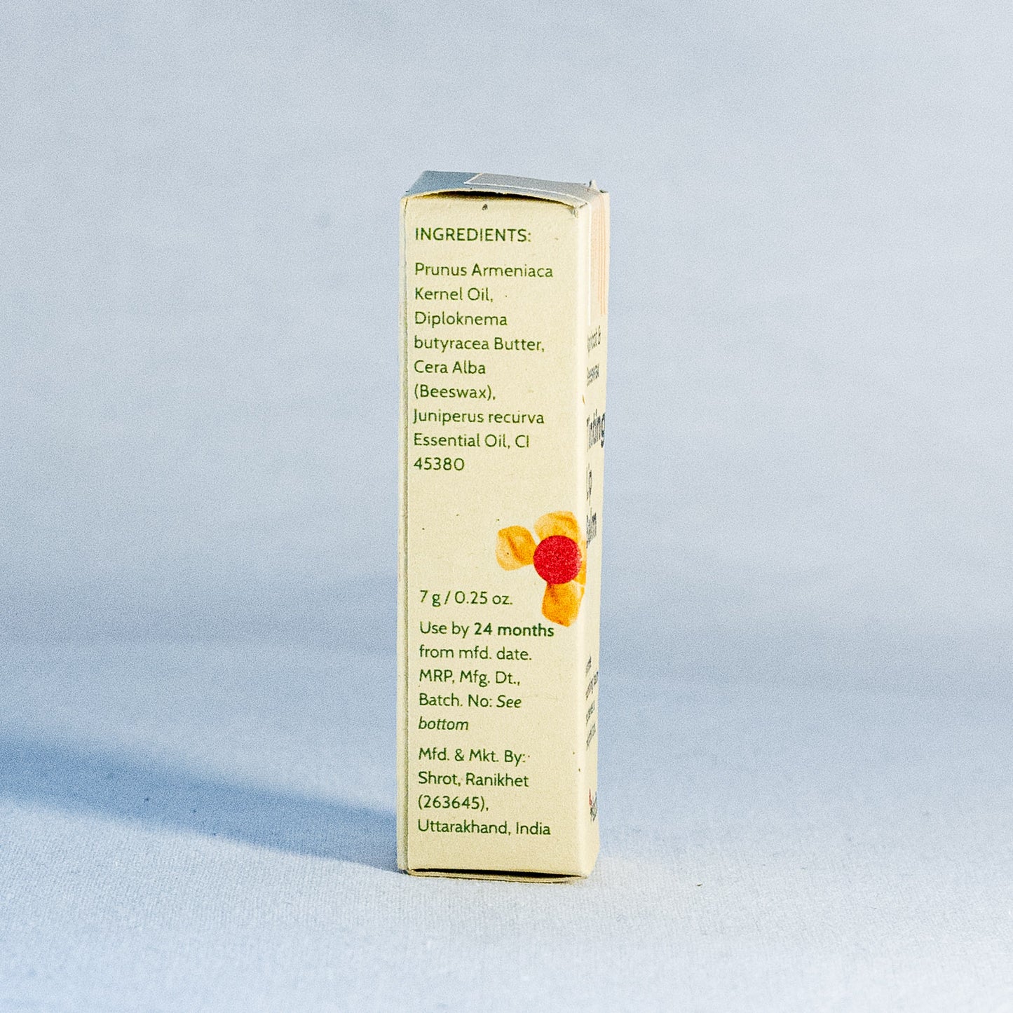Small rectangular box with ingredient list by a natural skincare brand called Shrot on a light blue background