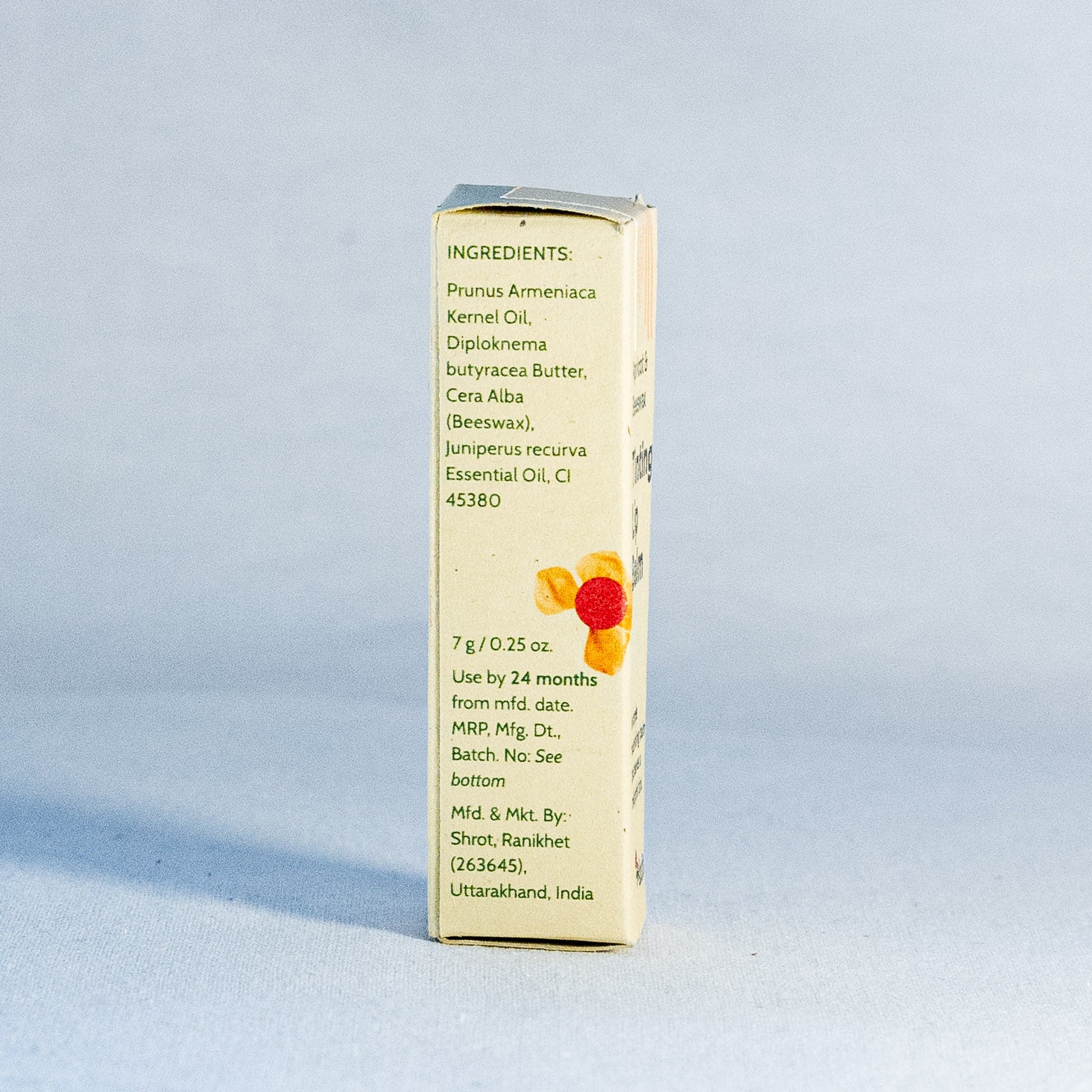 Small rectangular box with ingredient list by a natural skincare brand called Shrot on a light blue background