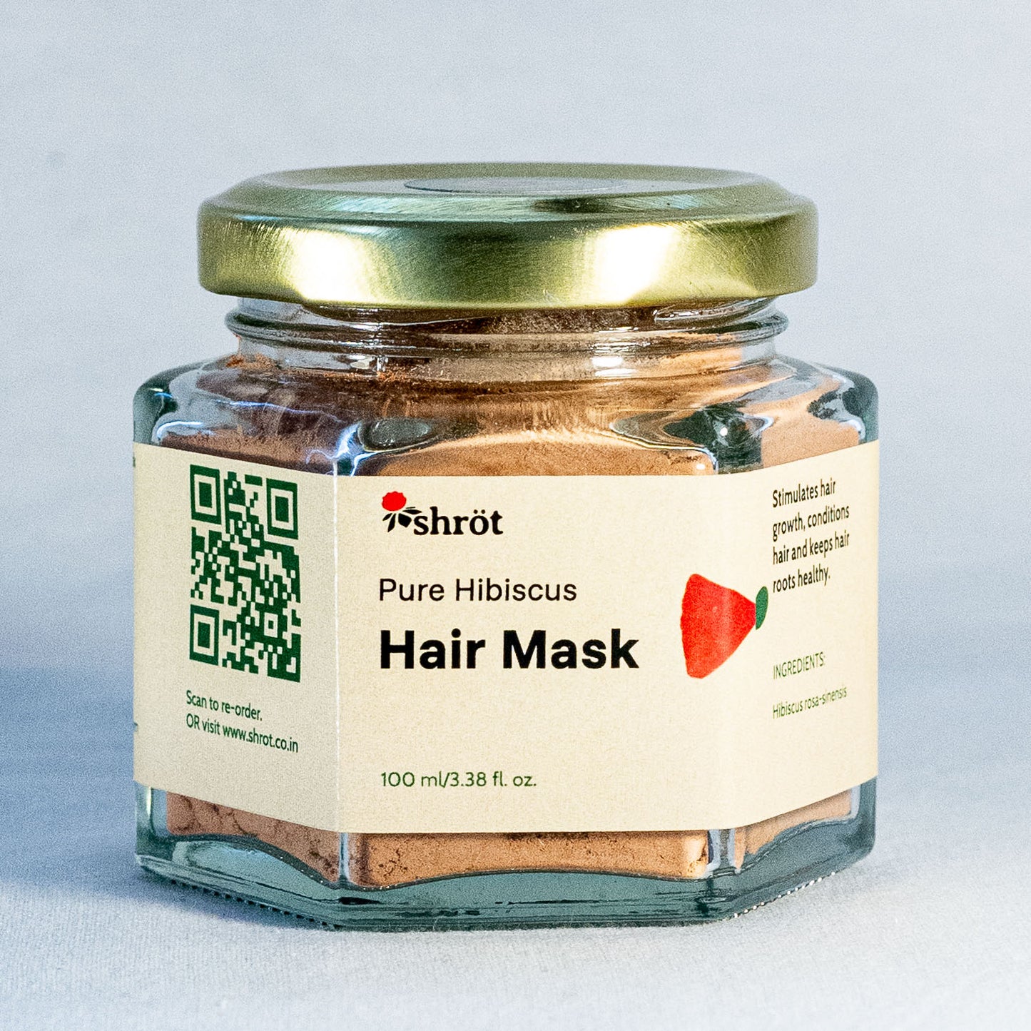 Jar of Pure Hibiscus Hair Mask by Shrot natural skincare with a label on a light gray background