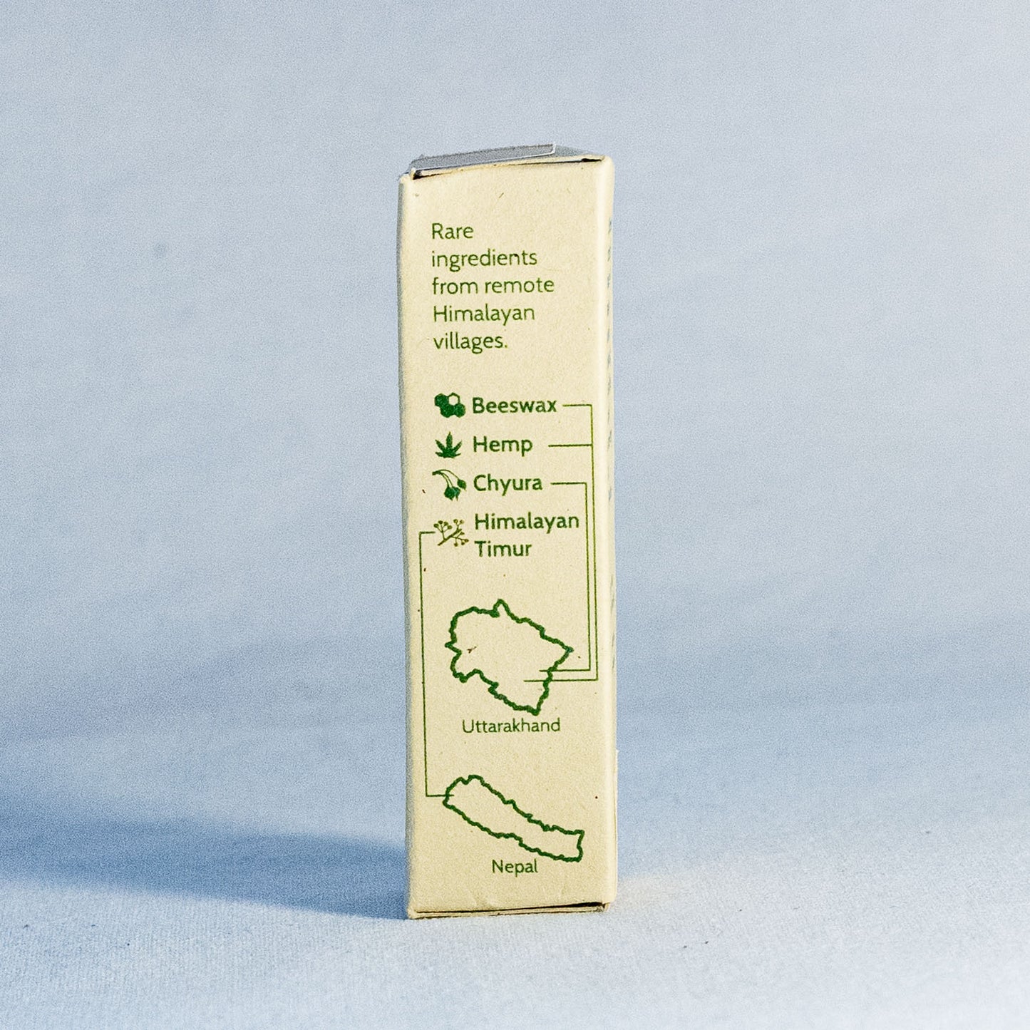 Product packaging with ingredient information by a natural skincare brand called Shrot, on a light blue background