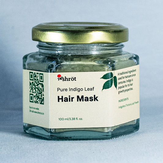 Jar of Shrot Pure Indigo Leaf Hair Mask with a gold lid on a gray background