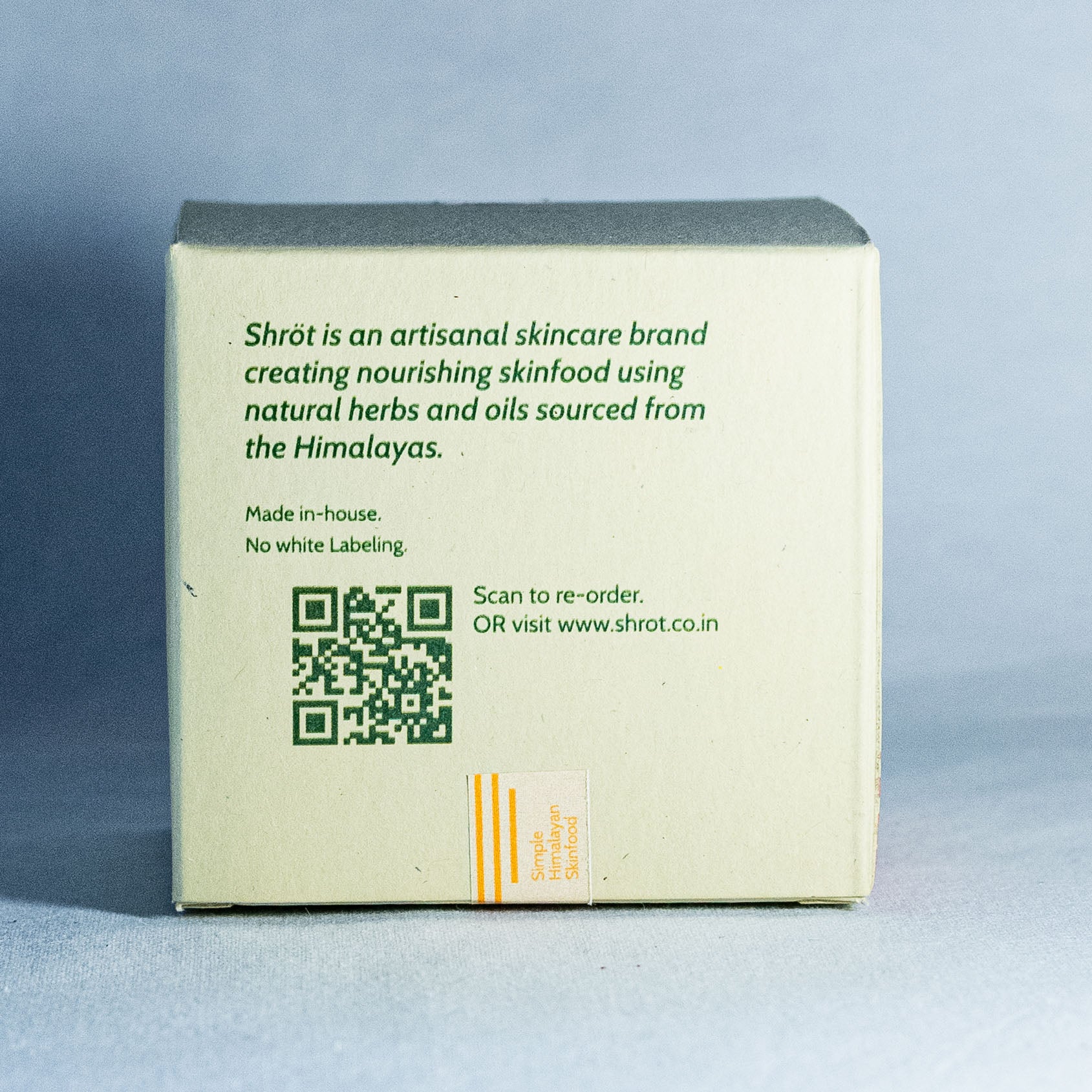 Skincare product box by Shrot Natural beauty products with branding and contact information on a gray background