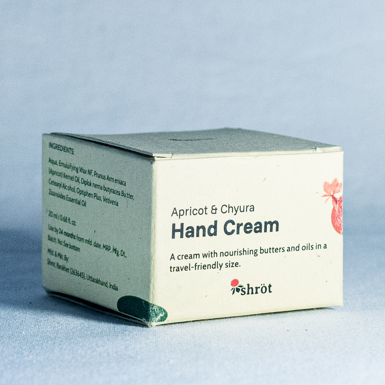 Box of Apricot & Chyura Hand Cream on a light blue background by a trending natural skincare brand called Shrot
