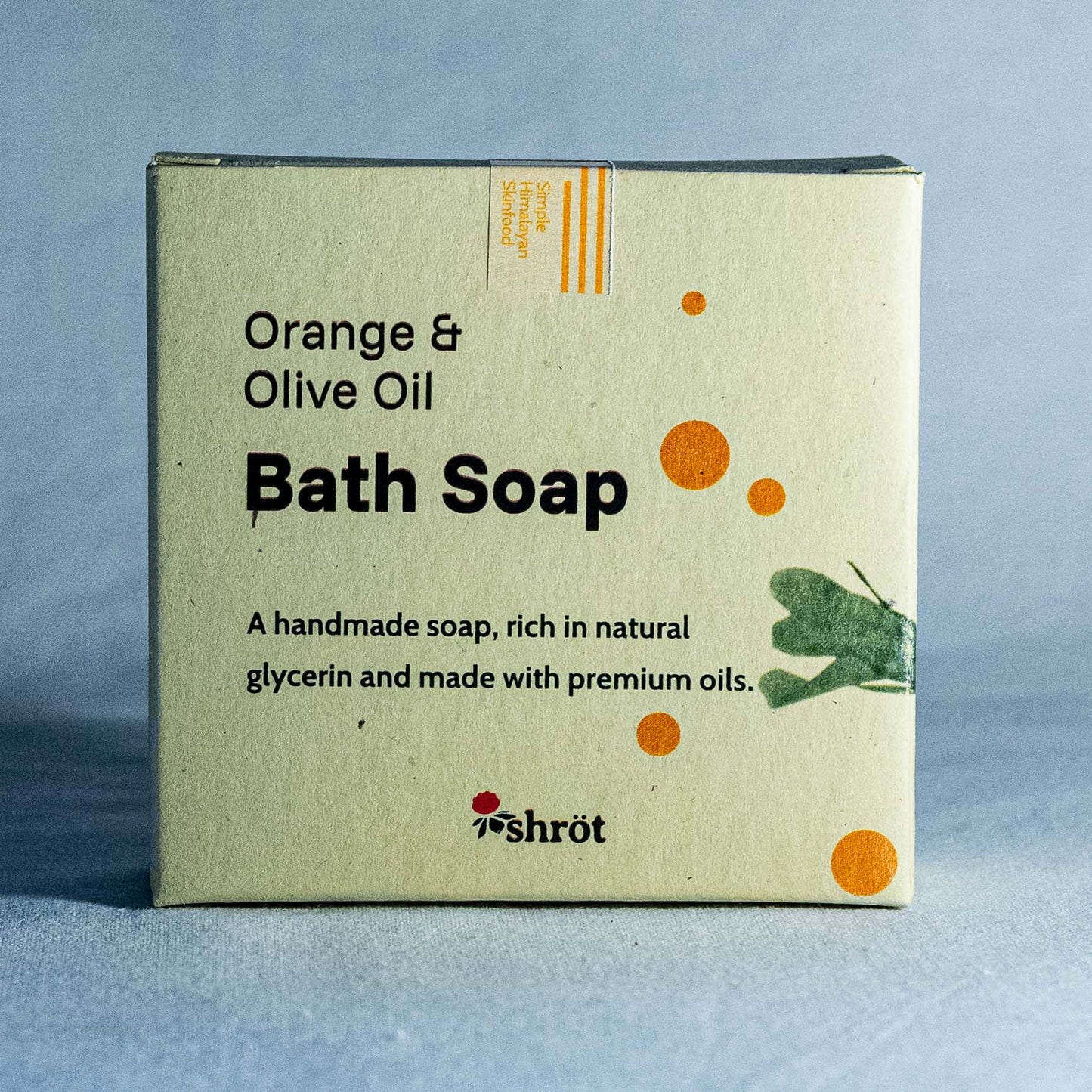 Box of Orange & Olive Oil Bath Soap with branding on a blue background