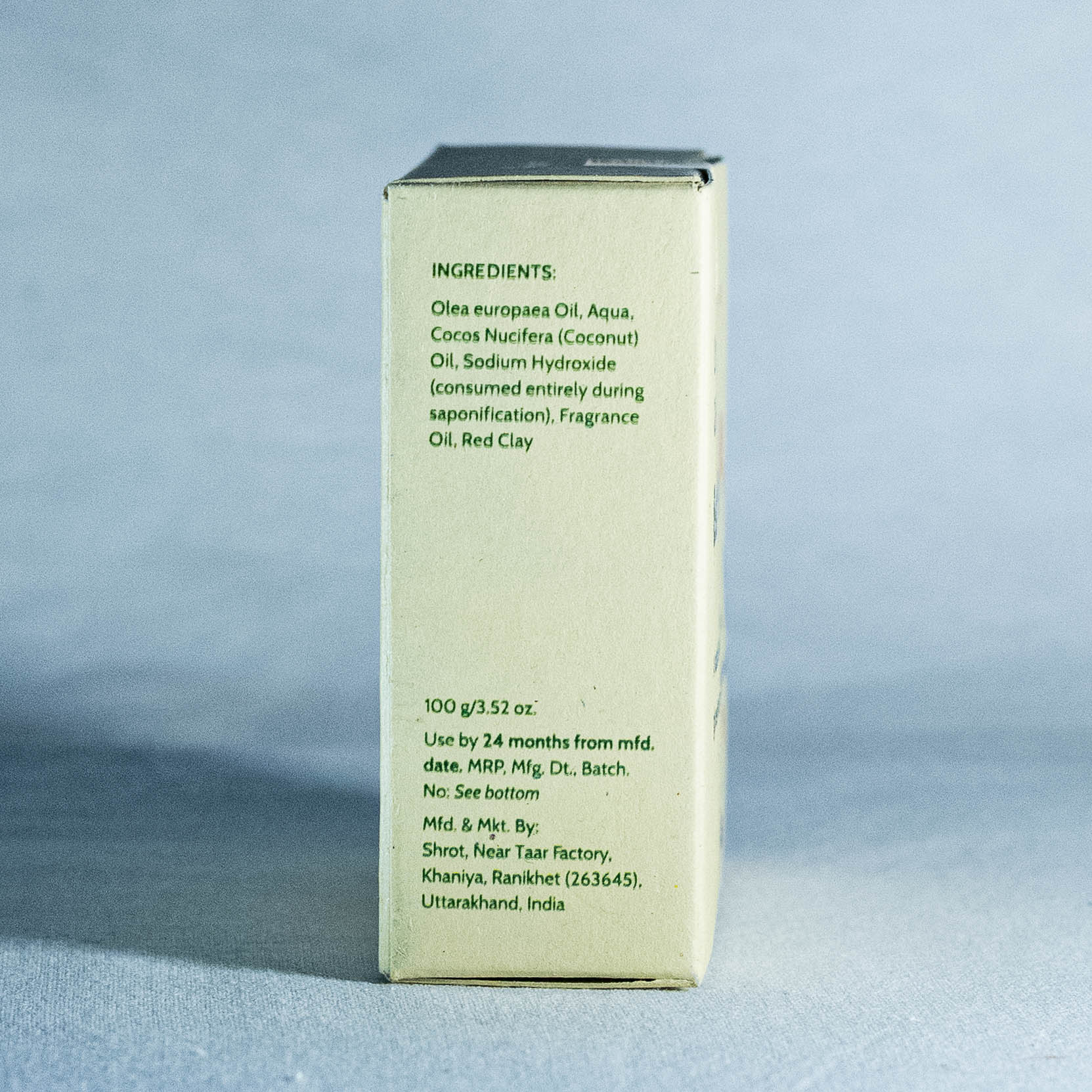 Box with ingredient list and product details on a blue background