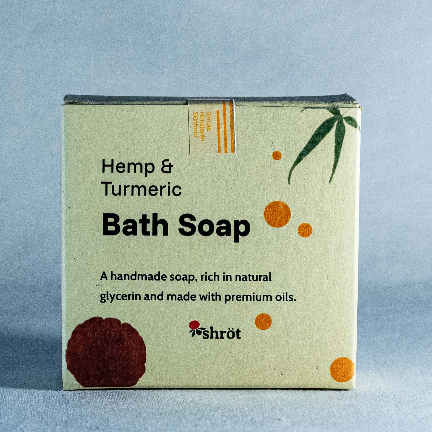 Box of Hemp & Turmeric Bath Soap by Shrot with branding on a light blue background