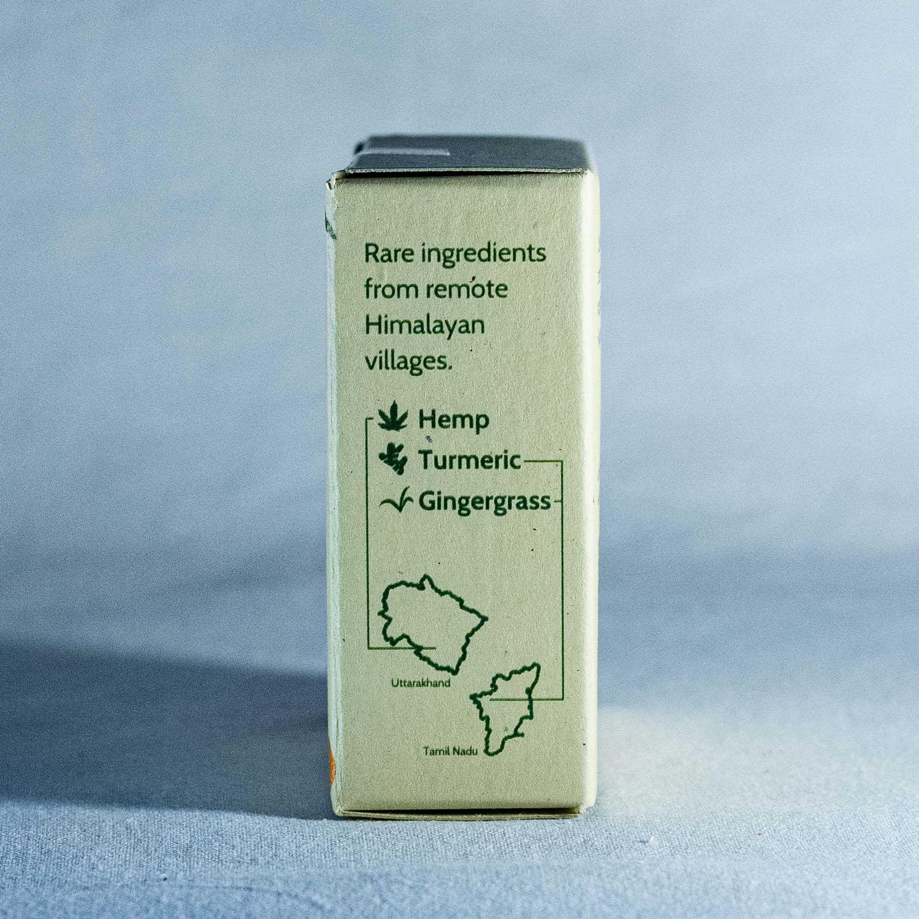 Box of Shrot soap with text about rare ingredients from remote Himalayan villages on a gray background