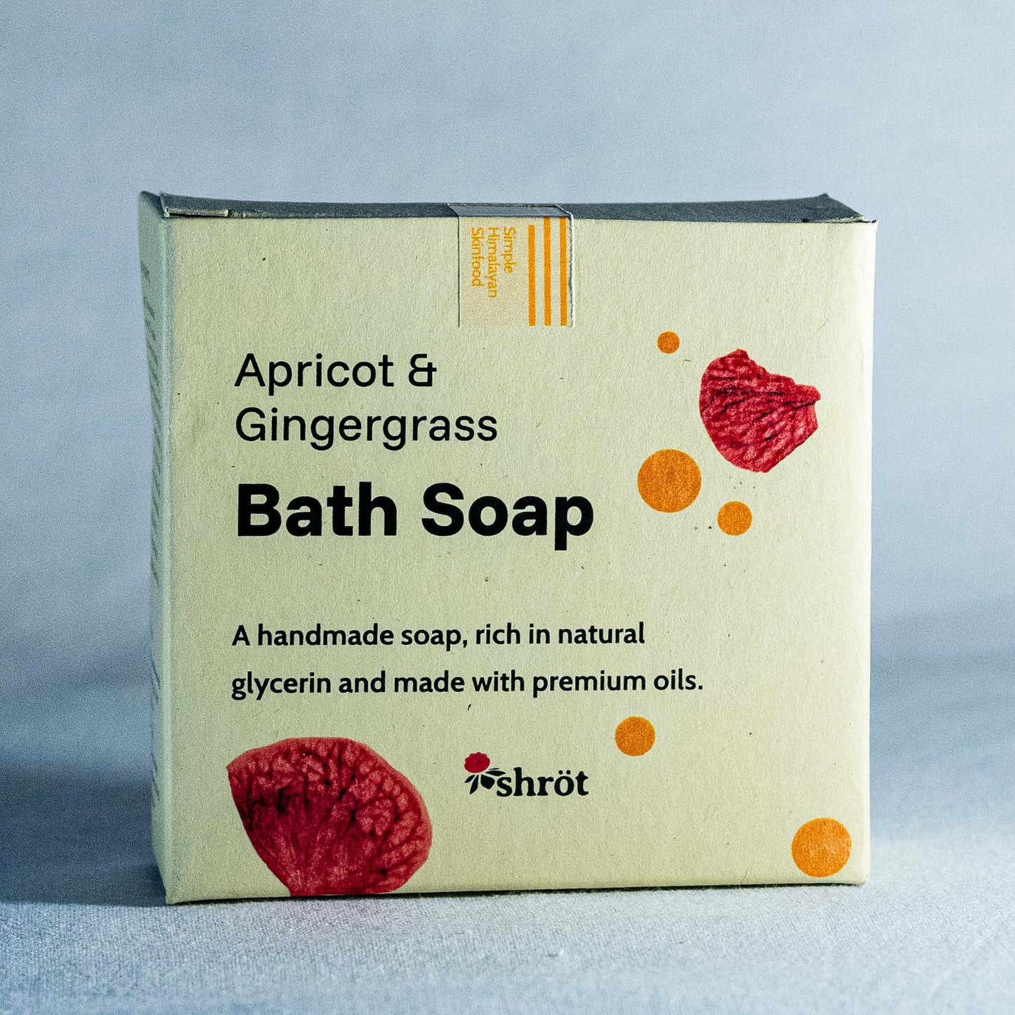Box of apricot and gingergrass bath soap by Shrot on a gray background