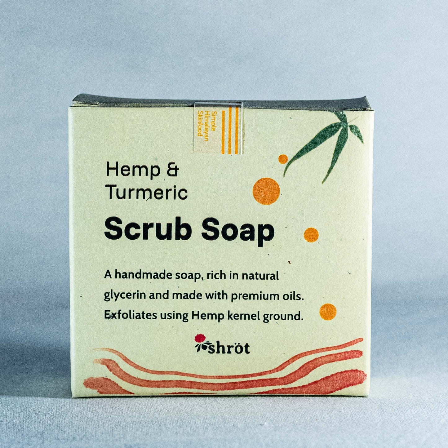 Box of Hemp & Turmeric Scrub Soap by Shrot with branding on a gray background