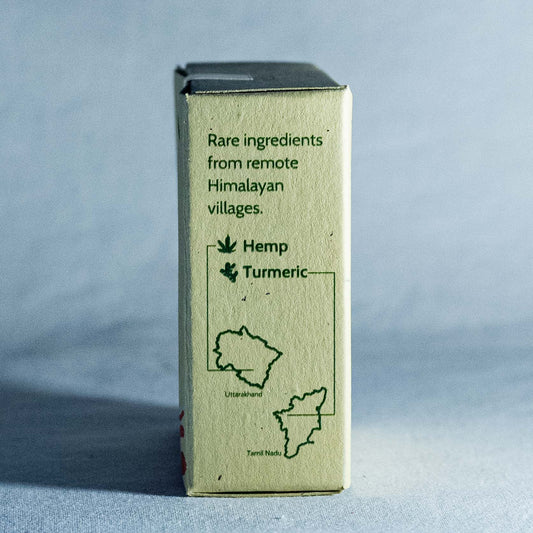 Box labeled 'Hemp Turmeric soap' by Shrot with text about rare ingredients from remote Himalayan villages on a blue background.