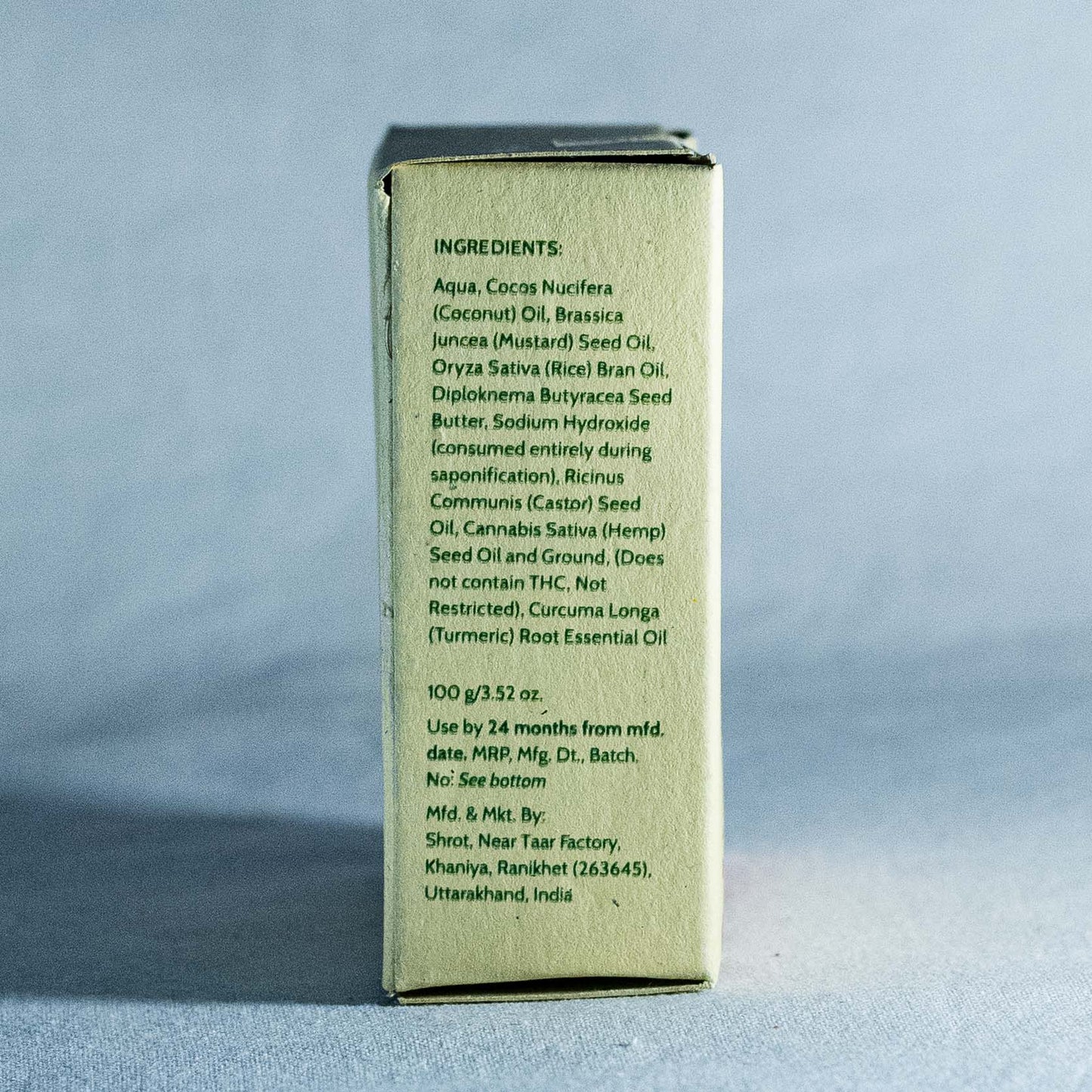 Box with ingredient list on a light blue background